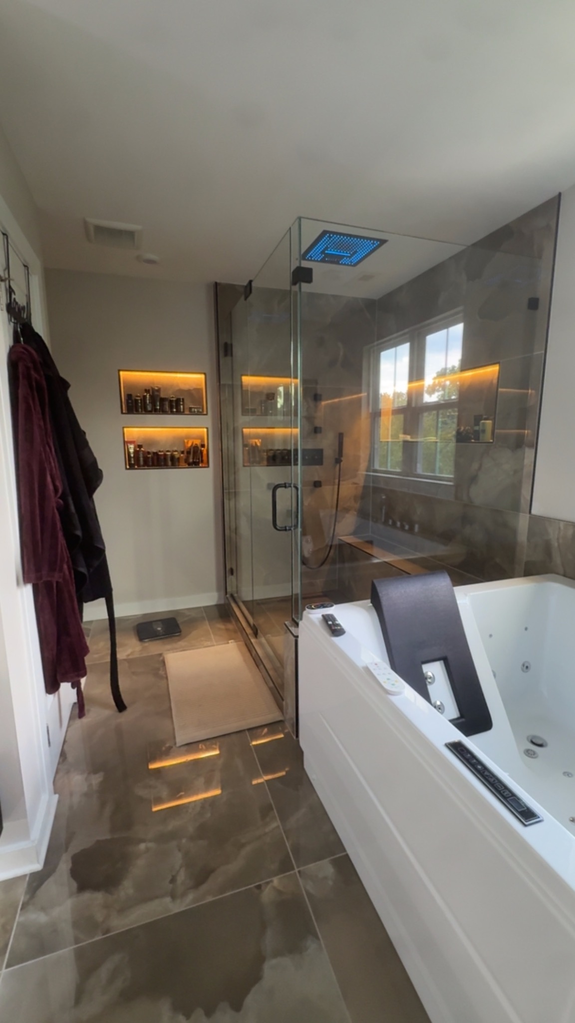 Luxury bathroom renovation by Above the Sky Renovations